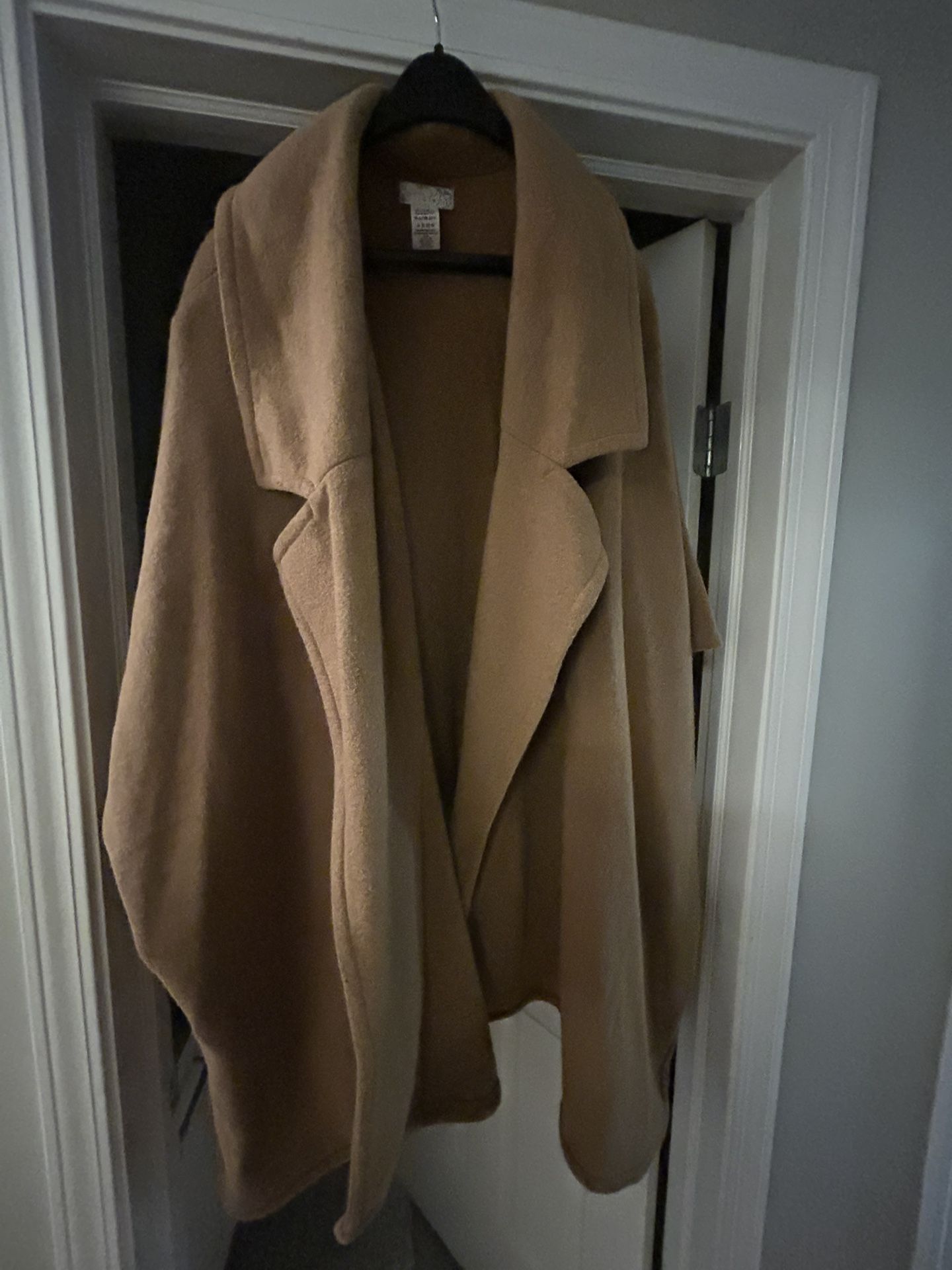 Woman’s Free People Coat. Camel Color