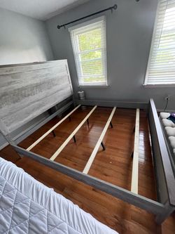 King-size bed frame with headboard
