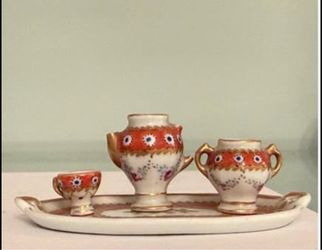 4-piece vintage  miniature tea set    Manufacturer: Limoges