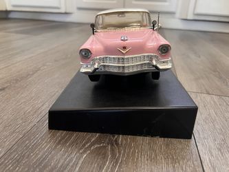 Diecast 1/18 scale Elvis Presley 1955 Pink Cadillac great condition base of car sounds has different phrases of Elvis Presley really nice model