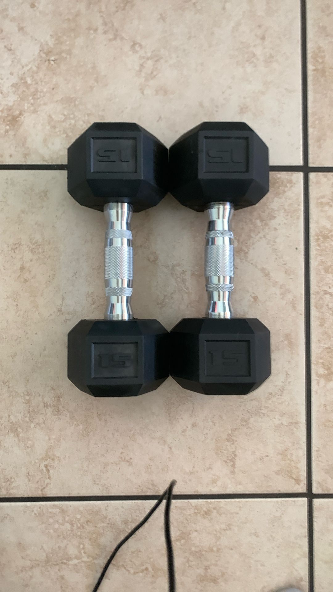 Brand new 15 pound dumbbells in good condition