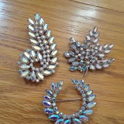 Vintage jewelry.  Classic Brooches B David Designer