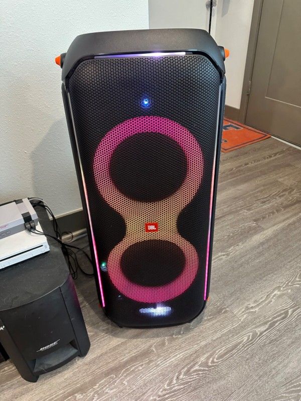 JBL Partybox 710, with two microphone jacks and amp plug in. Barely used.