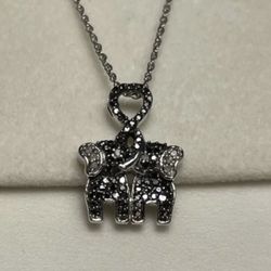 1/4 Ctw Black & White Real Diamond Kissing Elephant Pendant 925 Sterling Silver  PRODUCT DESCRIPTION Product Information  Brand	Affinity Fashion Jewel