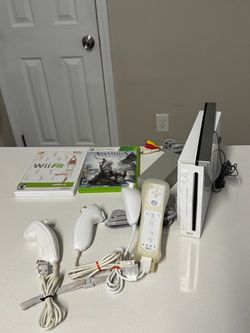 Nintendo Wii Console with Games and Controllers