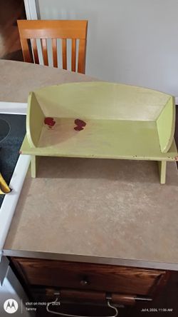 Small green wooden bench