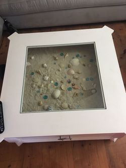 Coffee table in great condition can put anything you like inside