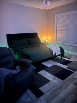 Black  end tables with LED lights.