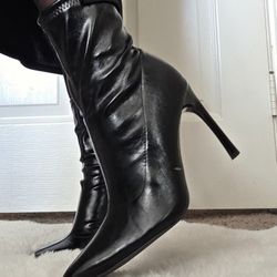 Black faux leather ankle boots with a 4" heel 