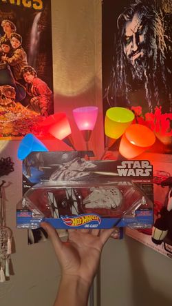 Die cast hot wheel collectables the fighter vs the millennium falcon.
