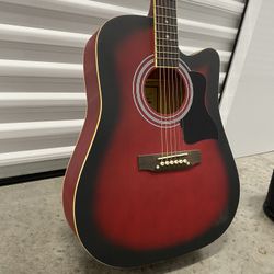 Red Guitar (comes with case)