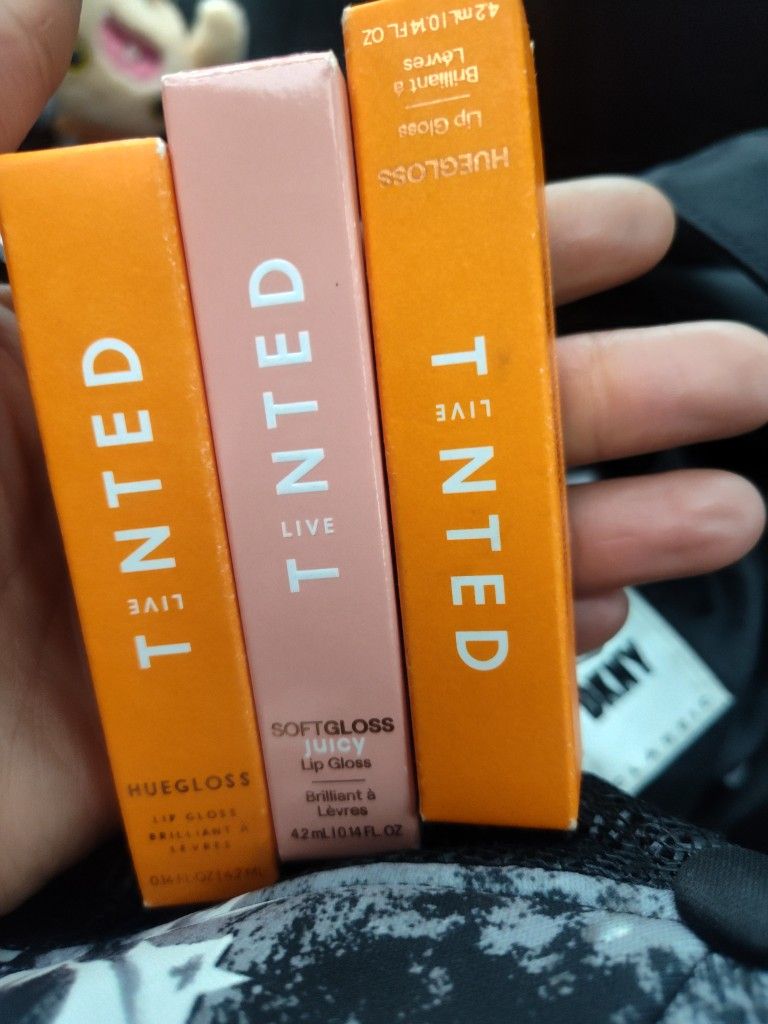 All 3 Tinted Lip Gloss For $35