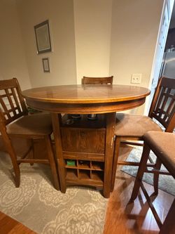 Round Oak Pub Table with 4 Chairs and Storage