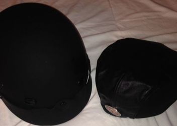 Harley Davidson helmet and leather hat