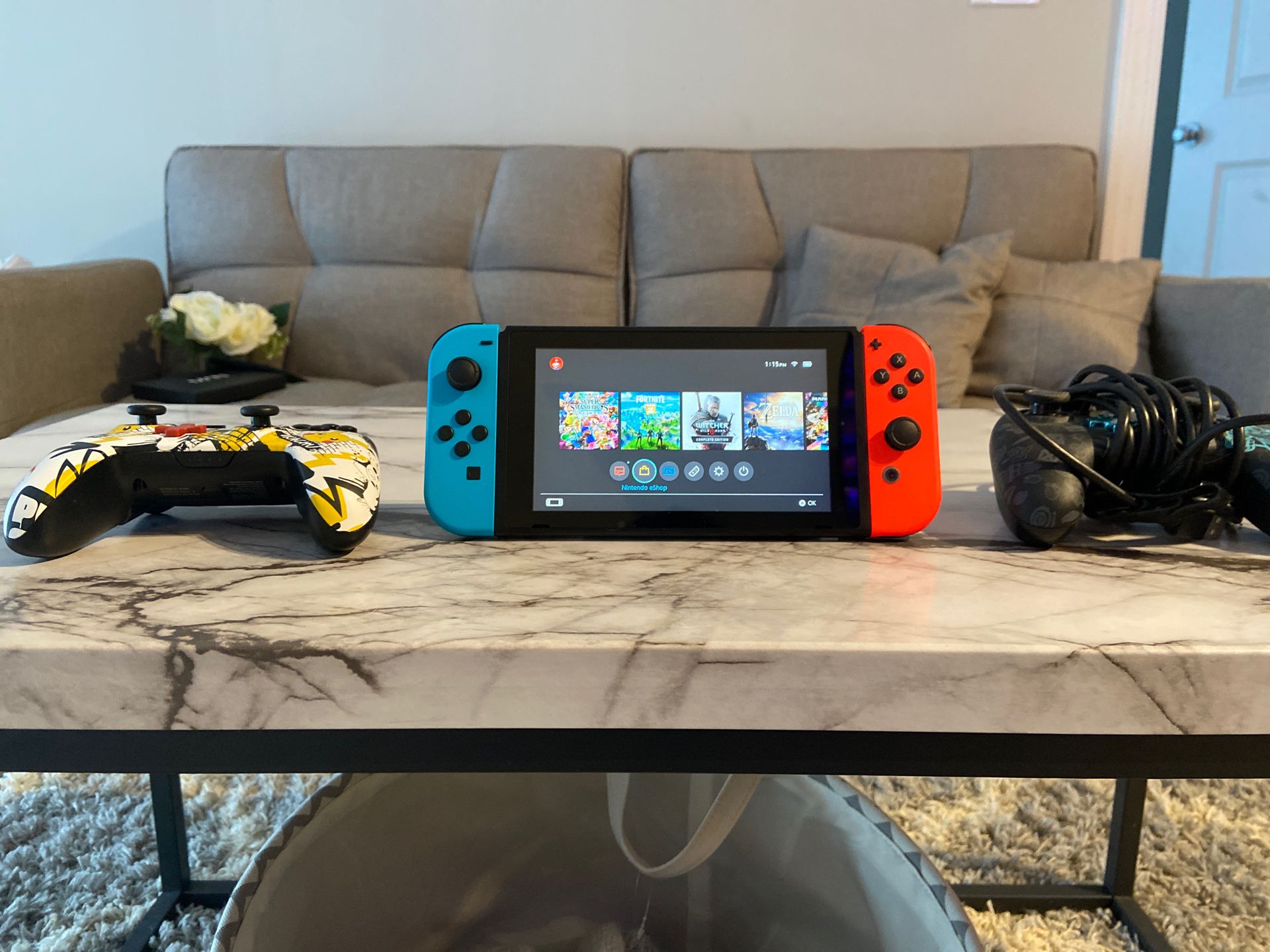 Nintendo switch with games and controllers