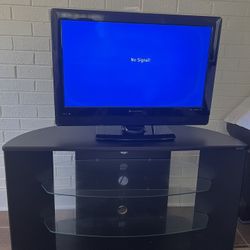 32in TV with TV stand and Home Phones 