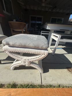 Upholstered X-base stool/ottoman with a diamond-pattern