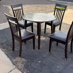48 In Round Drop Leaf Table And Chairs Used