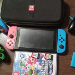 Nintendo Switch W/ Accessories And 2 Mario Games