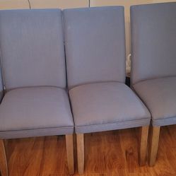 4 BLUE HIGH BACK DINING CHAIRS.