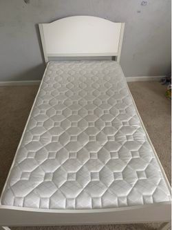 Bed with mattress
