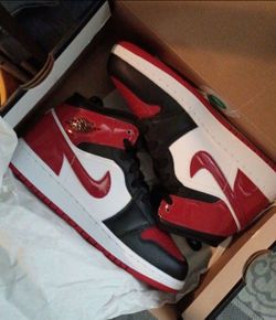 Air Jordan 1 Mid Red Black White Sneakers