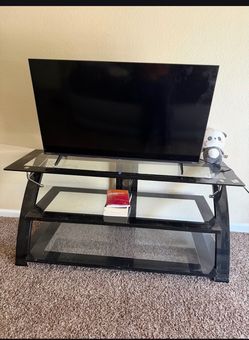 45 inch tv w/legs + black glass stand  ($12 more for remote)