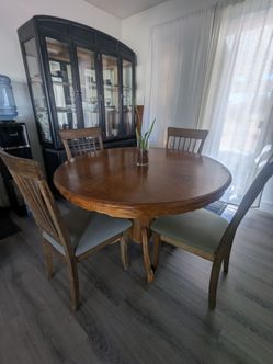 Round, wood dining room table