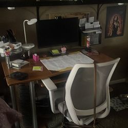 Desk with pullout keyboard, and two shelves on the side