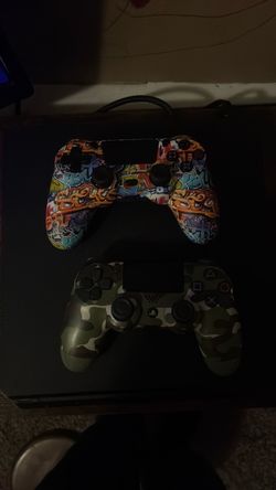 PS4 Console with Two Controllers