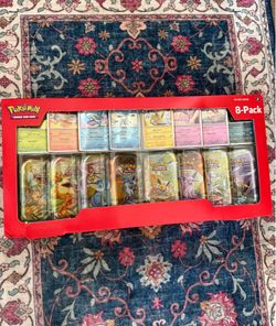 Pokemon TCG Prismatic Evolutions Mini-Tins 8-pack