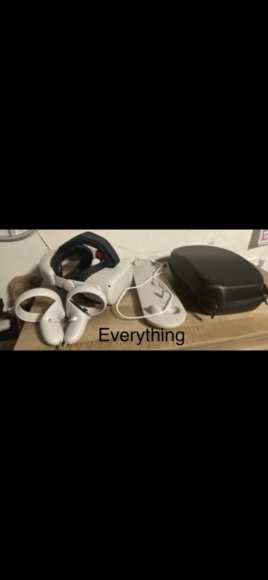 Oculus Quest 2 + Comfort Head Strap+ Charging Station+ Portable Case.
