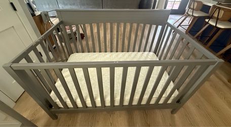 Baby crib and diaper changing table