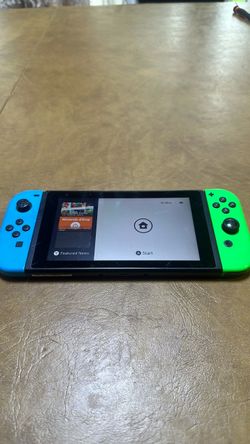 Nintendo Switch with Neon Blue and Green Joy-Cons