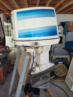 200 hp Johnson outboard on stand