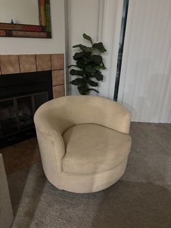 beige swivel chairs (2)