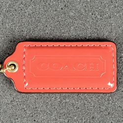 Coach Red-Orange Leather Hang Tag 2" × 1"