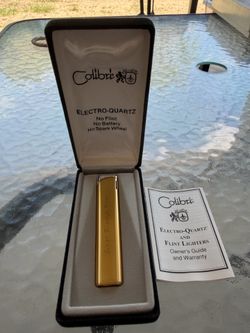 Vintage COLIBRI Pocket Lighter w/ Box ELECTRO-QUARTZ no flint no battery no spark wheel. Engraved with “Love Always Rose”