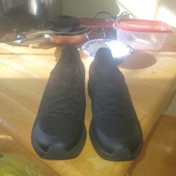 pair of TredSafe slip-resistant athletic work shoes in black. 