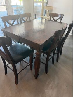 Pub height dining table