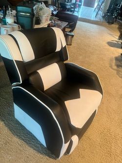 Gaming Recliner Chair for sale. • Comfortable reclining backrest • Pop-out footrest • Modern black & white design • Includes lumbar support pillow