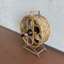 One vintage rattan and bamboo wine bottle rack