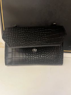 Small , black belt bag