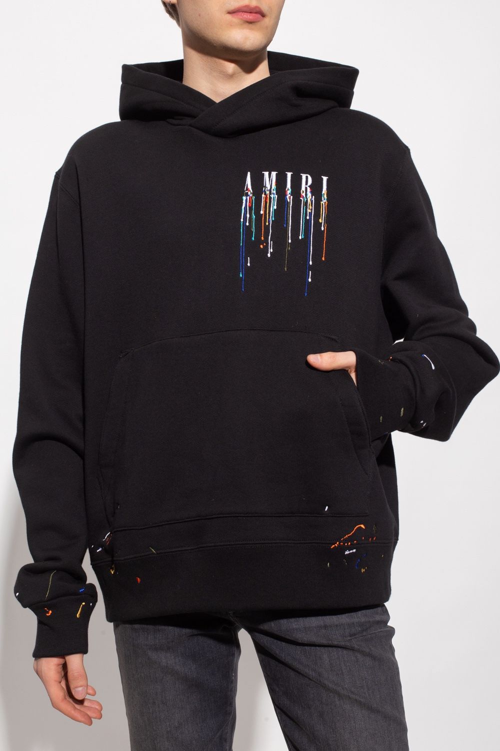 black hoodie, Amiri, graphic print, multi-colored accents, streetwear, oversized, luxury hoodie, casual hoodie, urban style, pullover