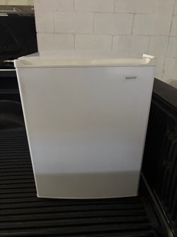 White mini fridge