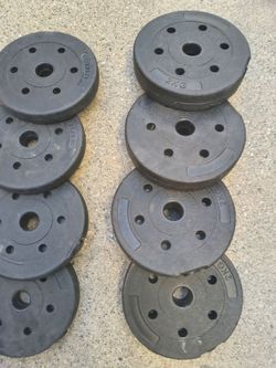 8 pesas 4 de 2Kg.cada una  y 4 de 1.25 Kg.cada una.