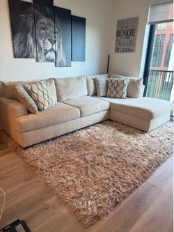 Beige Sectional Couch with Chaise + Shag Rug