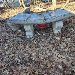 Outdoor Concrete bench  has small crack on it but otherwise it's in good shape to use it on garden  decorations