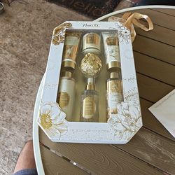 The product is a Nanette Lepore 7-piece French Vanilla Body Care Collection bath set.