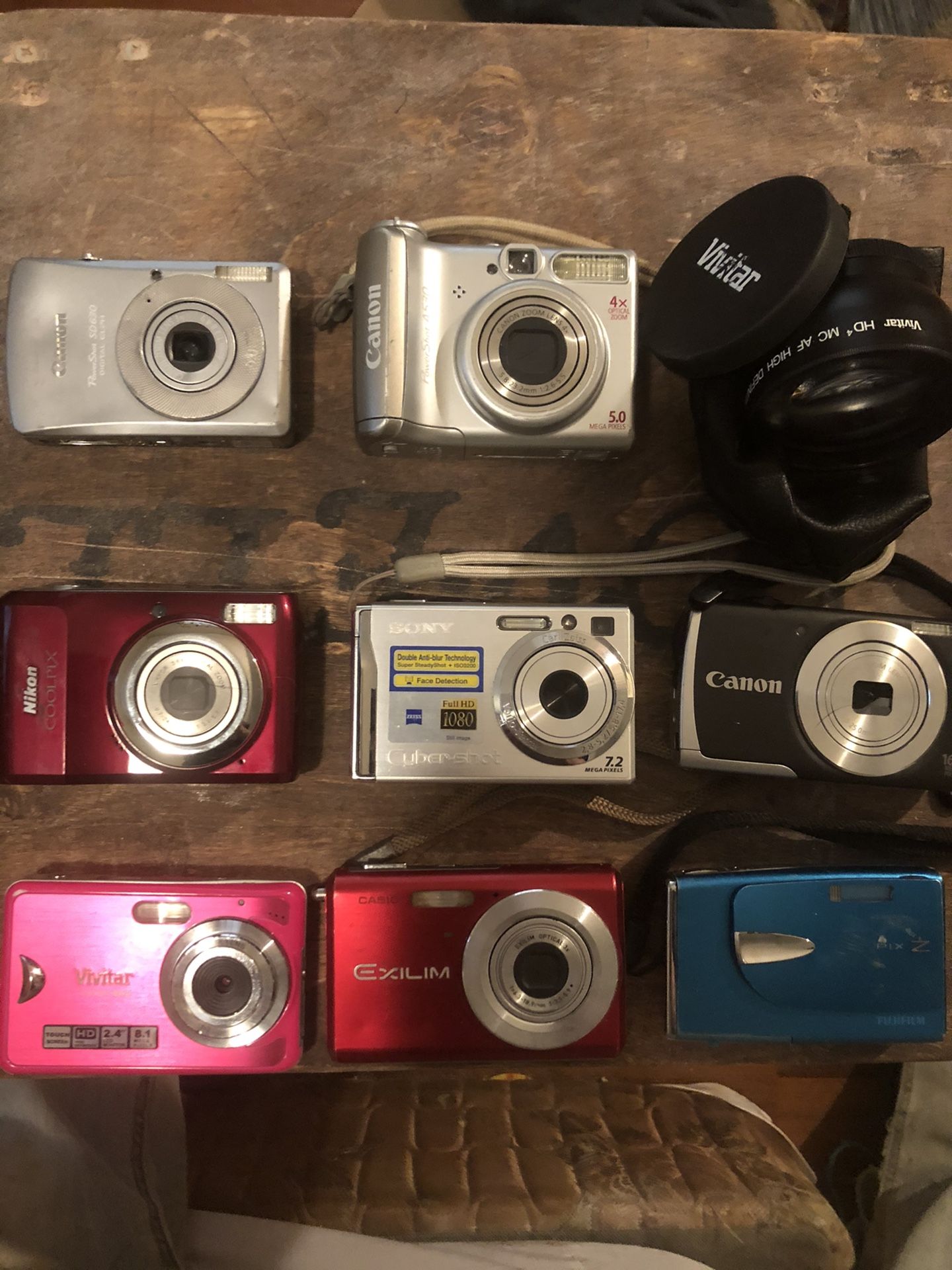 (8)Digital Camera’s, Vivitar camera lens and Polaroid one step flash camera